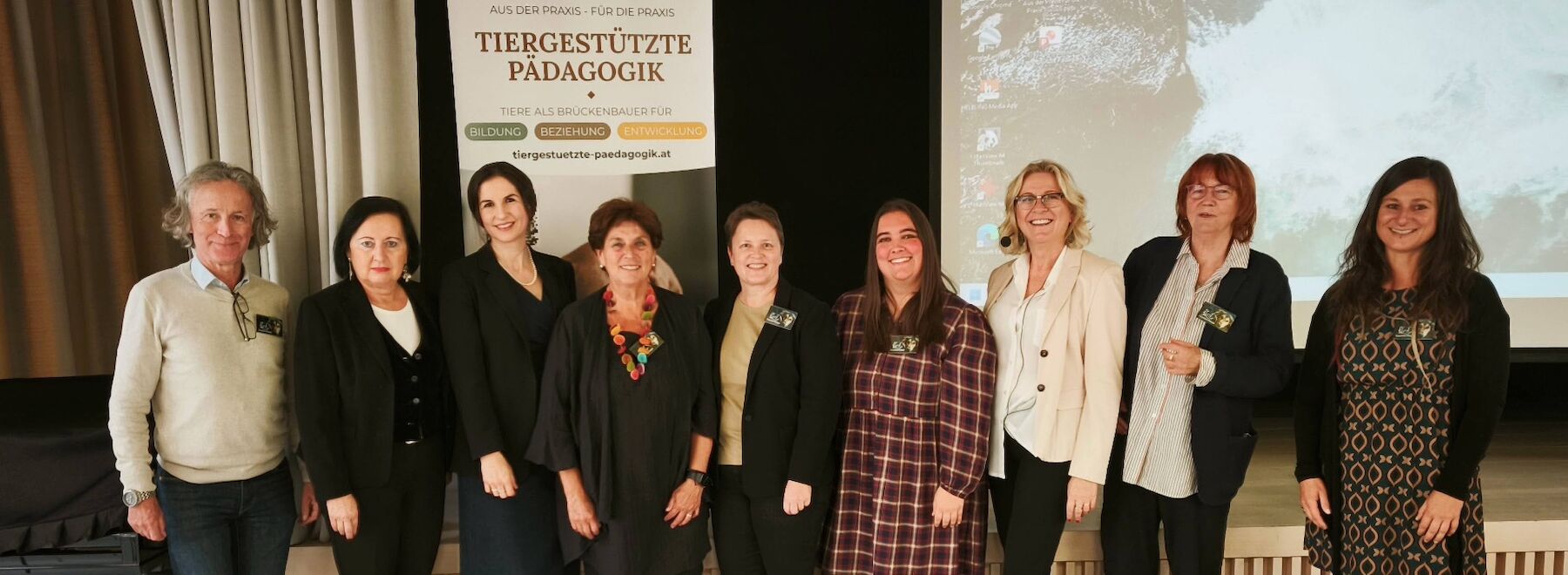 Gruppenbild: Verantwortliche des Symposiums am Podium